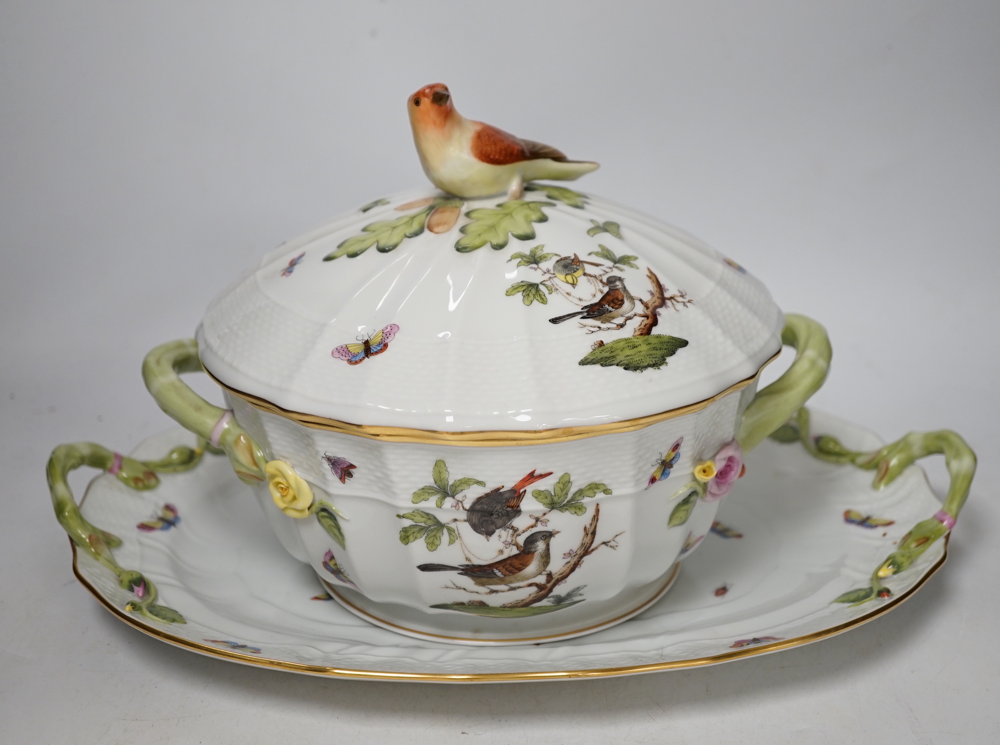 A Herend Rothschild birds pattern soup tureen cover and stand, two vegetable tureens and an oval dish
